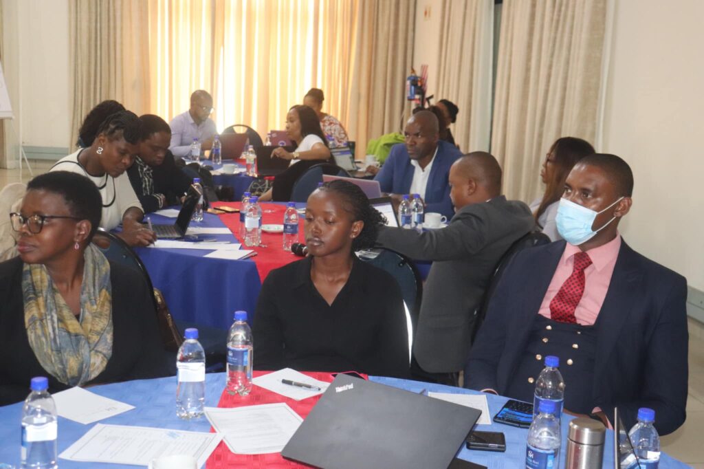 Stakeholders engage in strategic discussions at the Commerce Ministry's consultation workshop.
