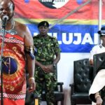 His Majesty King Mswati III addresses attendees at the Buganu ceremony, announcing plans to expand the Hlane Royal Residence arena to accommodate growing crowds.