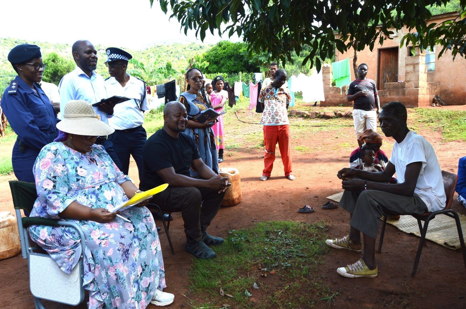 Deputy Prime Minister Thulisile Dladla engages with residents of Madlangemphisi Inkhundla during a visit to ten vulnerable households identified for housing support under the King’s directive to provide decent shelter.