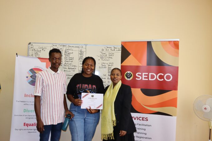 Participants of the ESGM entrepreneurship workshop celebrate the completion of their five-day training at SEDCO Manzini Estate.