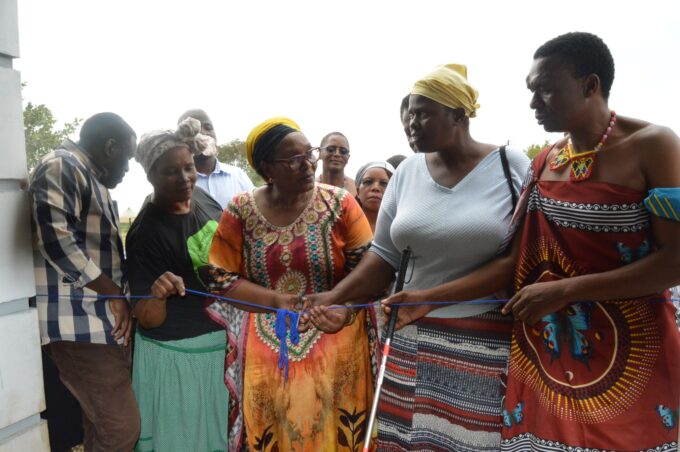 Nomphumelelo Sithole with Deputy Prime Minister Thulisile Dladla during the handover of her new home in Ndzangu.