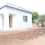 Deputy Prime Minister Thulisile Dladla hands over the new house to Mkhulu Albert Magongo in Macetjeni.