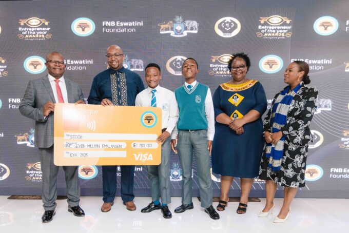 FNB Eswatini CEO Thokozani ‘TK’ Dlamini holds a symbolic cheque during the launch of the 2025 Entrepreneur of the Year Awards at Happy Valley Hotel.