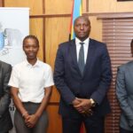 Prime Minister Russell Dlamini meets with Youth Chamber of Commerce executives to discuss economic initiatives.