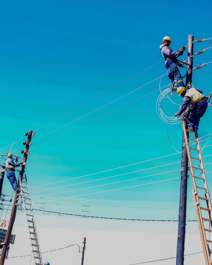 EEC workers carrying out maintenance on power lines