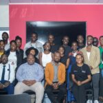 Participants and speakers, including SEDCO’s Bhekani Dlamini, pose for a group photo after the Startup Grind Manzini panel discussion at the American Corner, Manzini Library.
