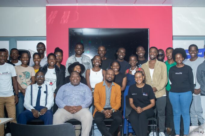 Participants and speakers, including SEDCO’s Bhekani Dlamini, pose for a group photo after the Startup Grind Manzini panel discussion at the American Corner, Manzini Library.