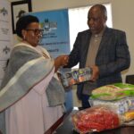 Deputy Prime Minister Thulisile Dladla receives food parcels from Reverend Johannes Mazibuko of Mbabane Alliance Church during the official handover ceremony at the DPM’s Office. The donation will support vulnerable communities across Eswatini. Photo by DPM Office