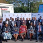 Minister Chief Ndlaluhlaza Ndwandwe receives the new Alcohol Evidence Truck from Eswatini Beverages Country Director, Ms. Doreen Tumureebire, at the Ministry of Public Works and Transport in Mbabane. Photo: Ministry of Public Works and Transport building with the Alcohol Evidence Truck parked outside.