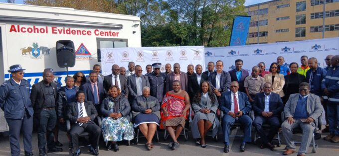 Minister Chief Ndlaluhlaza Ndwandwe receives the new Alcohol Evidence Truck from Eswatini Beverages Country Director, Ms. Doreen Tumureebire, at the Ministry of Public Works and Transport in Mbabane. Photo: Ministry of Public Works and Transport building with the Alcohol Evidence Truck parked outside.