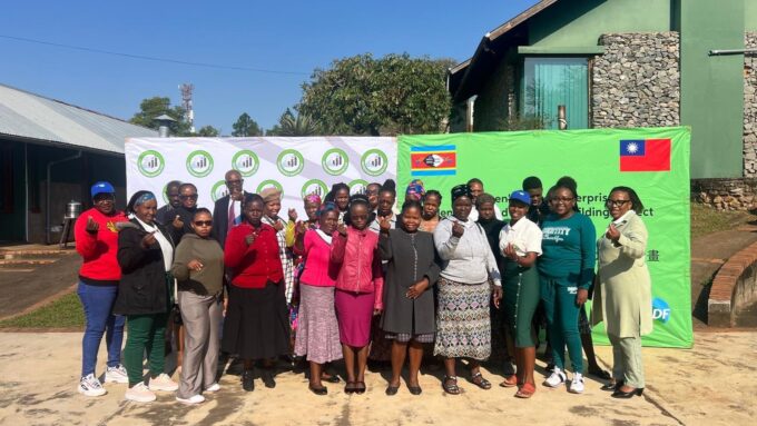 Participants of the Women’s Microenterprise Project share their experiences from international exhibitions during a session at Mananga Business Centre.