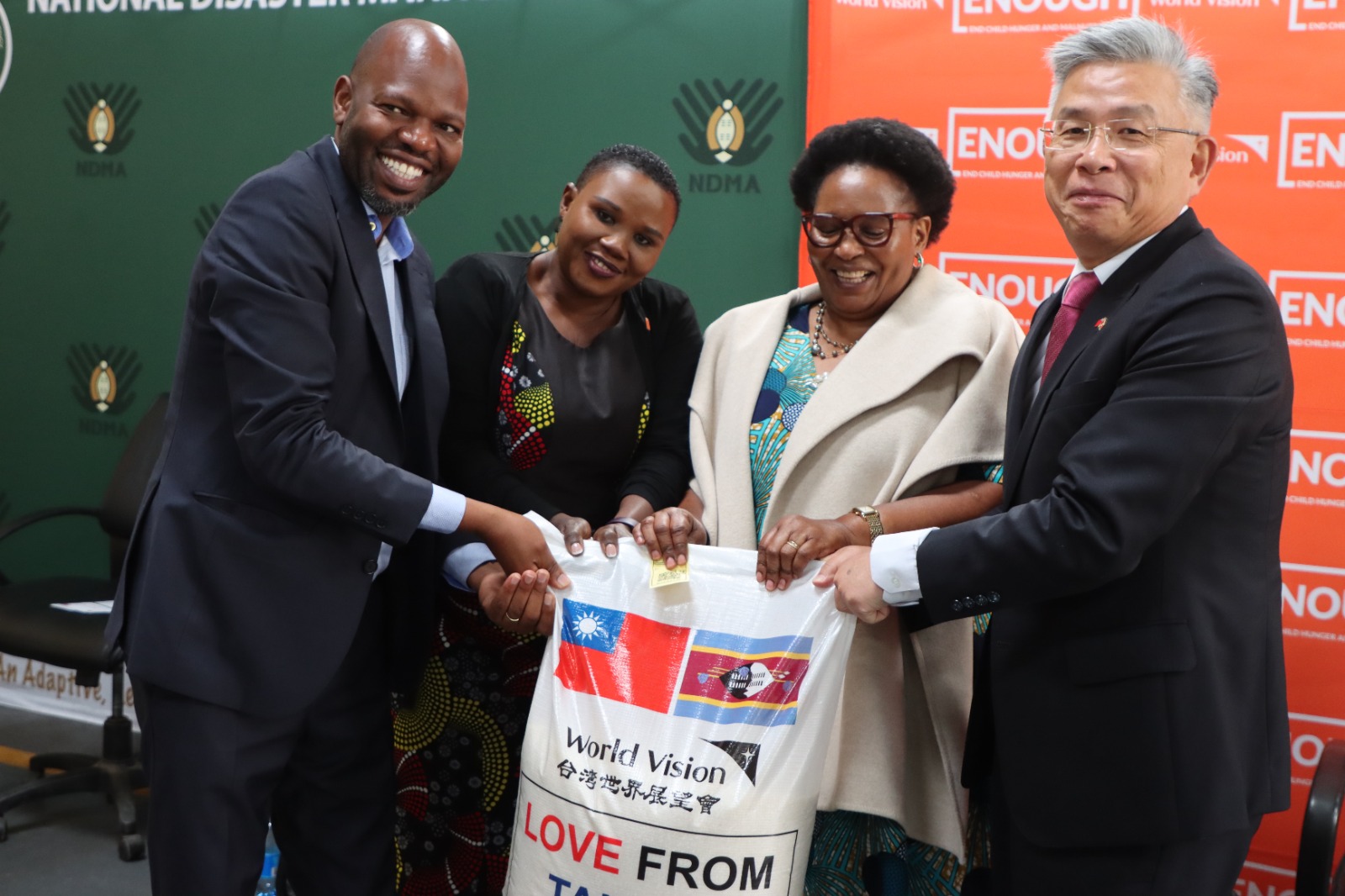 Deputy Prime Minister Thulisile Dladla receives a symbolic bag of rice during the launch of the national food assistance programme at the NDMA Warehouse in Matsapha, following a 2,000-ton donation from the Republic of China (Taiwan). Photo: NDMA