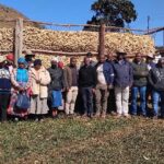EWADE leadership on the ground – Board members, executives, and senior managers of EWADE pose with local farmers during a field visit to Mahlangatsha