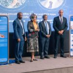 Minister of ICT Savannah Maziya (center) and ERS Commissioner General Brightwell Nkambule (right) unveil the Government In Your Hand and ERS TaxPal mobile applications during the launch event in Ezulwini.