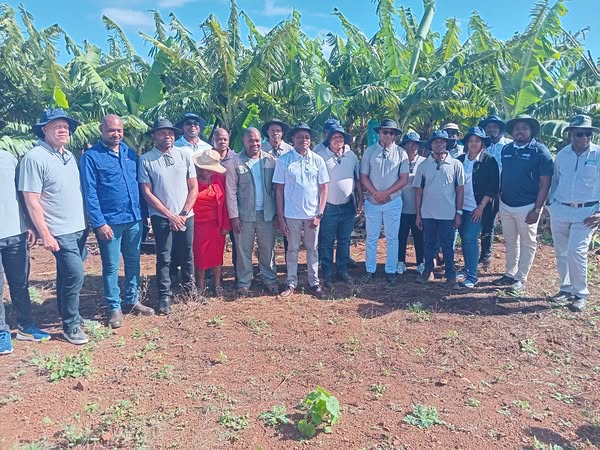 EswatiniBank Board members and Vulamatfuba Farmers cooperative leaders pose together during the Day Two tour at Gamula