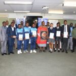 Minister of Labour and Social Security Phila Buthelezi joins students and teachers from Lamawandla and Mkhuzweni High Schools for a group photo after celebrating their top placements at the 2024 Aqualibrium Water Competition in South Africa.
