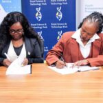 JA Eswatini Executive Director Phetsile Masilela signs the MoU with RSTP Acting CEO Nomvuyo Gulwako during a brief ceremony at the Royal Science and Technology Park. Photo: JA Eswatini