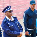 National Commissioner of Police Manoma Vusie Masango addresses Royal Leopard players, urging them to maintain focus ahead of the second leg match this Saturday.