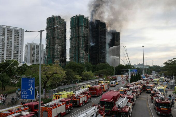 The damaged towers of Wang Fuk Court housing estate, in Tai Po, Hong Kong, China, November 27, 2025. REUTERS/Tyrone Siu