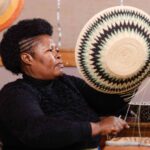 A Swazi artisan weaves a traditional basket, preserving Eswatini’s rich craft heritage. Photo by ITC
