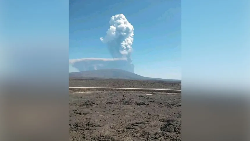 Ash billows from an eruption of the long-dormant Hayli Gubbi Volcano in Ethiopia's Afar region on November 23, 2025. Afar Government Communication Bureau/AP