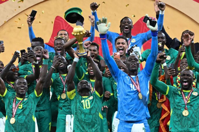 Senegal's Sadio Mane holds up the trophy as he celebrates with his teammates after winning the Africa Cup of Nations (AFCON) final football match against Morocco at the Prince Moulay Abdellah Stadium, Rabat, Morocco, Jan. 18, 2026. (AFP Photo)