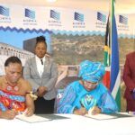 HRH Prince Lokhokhela, Minister of Natural Resources and Energy, and South Africa’s Minister of Water and Sanitation, Hon. Pemmy Majodina, sign the revised Komati Basin Water Authority treaty at Maguga Lodge.
