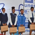 Learners from the Shiselweni Region hold laptops during a STEM activation programme supported by UNESCO and the Kingdom of Eswatini Academy of Sciences. Photo by UNESCO Eswatini.