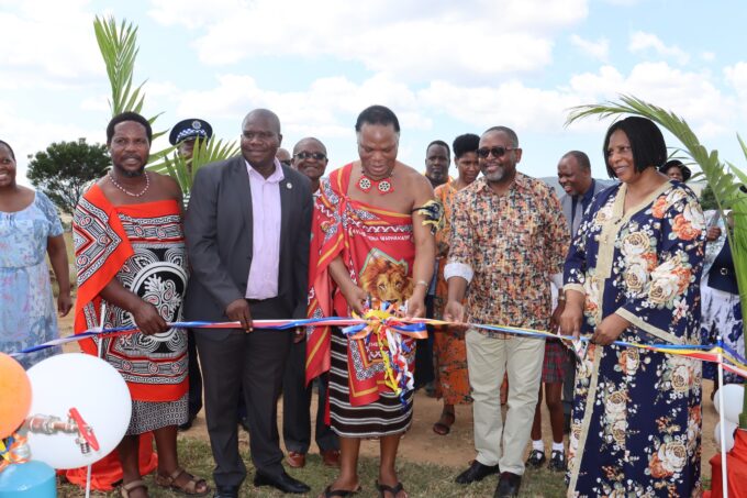 Minister HRH Prince Lonkhokhela and Amos Zaindi, National Director of World Vision Eswatini, cut the ribbon to officially launch the Mlindazwe-Tsambekwayo Water Supply and Sanitation Project in Gege.