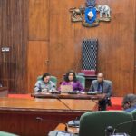 Honourable Minister Dr. E.T. Gina engages with Senate Portfolio Committee members during the presentation of MEPD’s 2025/26 annual performance report. Photo by MEPD