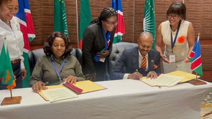 Commissioner Sam Shivute and Zambia’s Permanent Secretary in the Ministry of Finance and National Planning, Ms Mwaka Mukubesa, sign key agreements formalising the operationalisation of the One Stop Border Post at Katima Mulilo. Photo by Namibia Revenue Agency NamRA.
