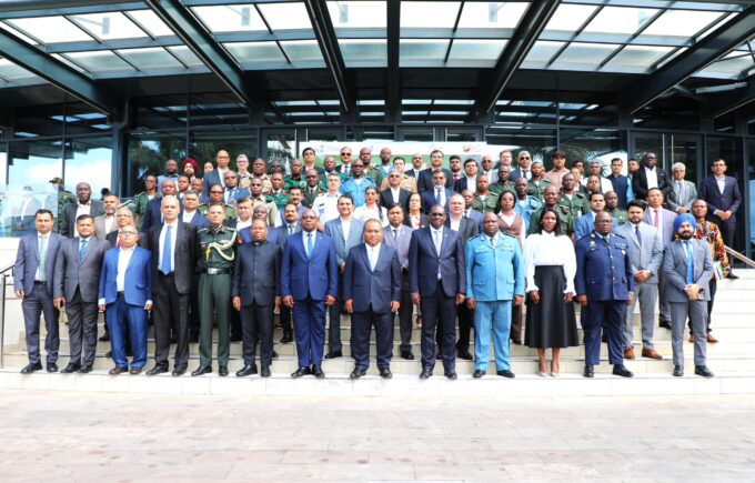 Casimiro Mueio and Indian High Commissioner Robert Shetkintong pose for a group photo with defence officials and industry representatives from Mozambique and India during the Defence Industry Seminar in Maputo.