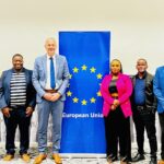 EU Ambassador to Eswatini Karsten Mecklenburg poses for a group photo with members of the Eswatini National Editors Forum after their engagement meeting at Hilton Garden Hotel in Mbabane.