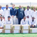 Minister of Economic Planning and Development Honourable Dr Thambo E Gina and UNDP Resident Representative Mr Henrik Franklin pose with some of the young entrepreneurs who received cellphone repair starter kits at Lubuli Inkhundla. Photo by UNDP Eswatini.