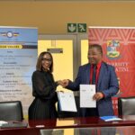 Ms. Andile Mtetwa-Amaeshi, ESWACAA Director General, and Prof. Justice Thwala, UNESWA Vice Chancellor, during the signing of the Memorandum of Agreement in Mbabane.