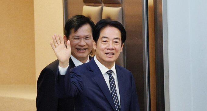 Foreign Minister Lin Chia-lung and President Lai Ching-te at a seminar Saturday. (CNA photo)