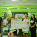 Partners display the E100 000 printed cheque for the Makoti Festival raffle draw during the announcement. Photo credit: Supplied.