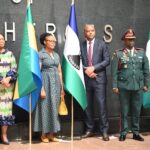 H.E. Ambassador Ntsiuoa Sekete of Lesotho oversees the ceremonial raising of the national flag at the African Union,