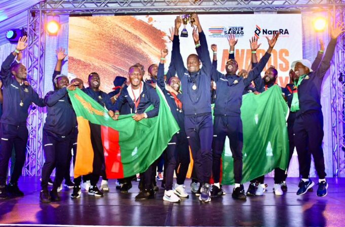 Zambian participants celebrate their overall and football victories at SAIRAG 2026, holding their trophies proudly. Photo by ZRA.