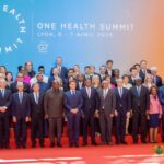 Heads of state join French President Emmanuel Macron for a group photo during the high level summit in Lyon, France, on April 8, 2026.