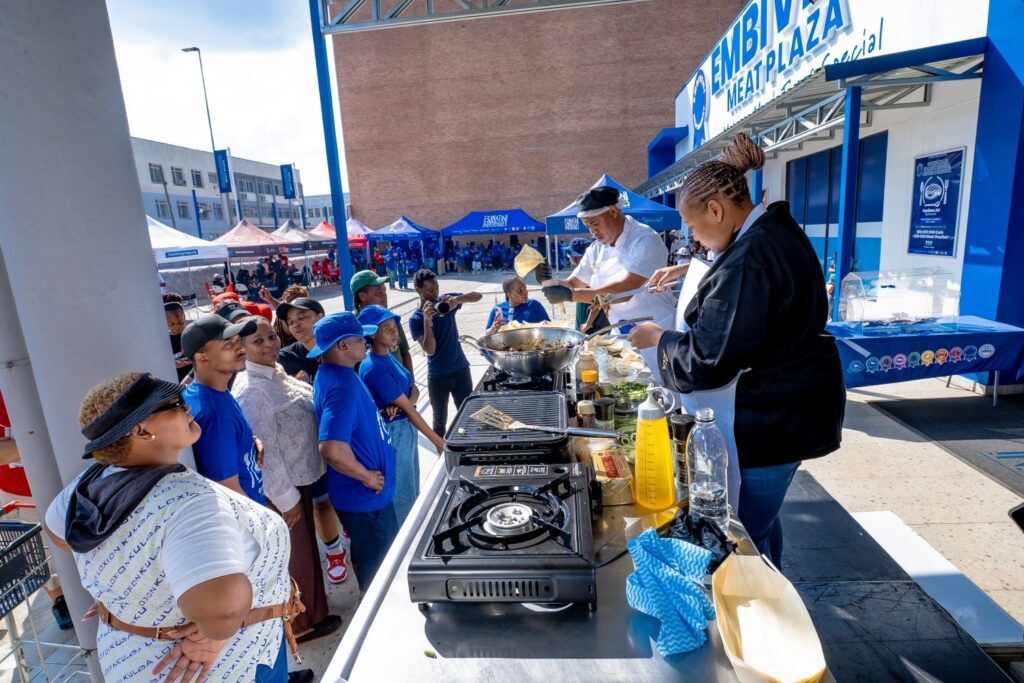 Award winning Chef Lindelwa Makhanya prepares her signature meals for guests during the Embiveni Meats Candana Ja activation at Mbabane Meat Plaza, treating shoppers to live cooking demonstrations and tastings. Photo by Tribe Studios.