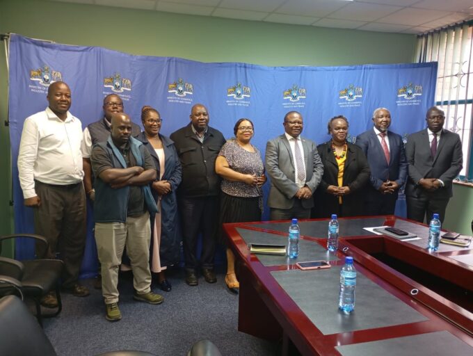 Honourable Minister Manqoba Khumalo and Business Federation of Eswatini leaders pose for a group photo during discussions on local business participation in the COMESA Summit.
