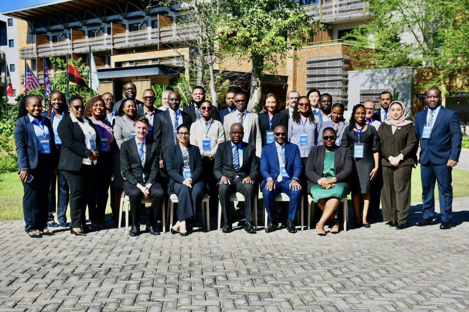 ZRA Commissioner General Dingani Banda, Global Forum Tax Policy Advisor Alex Nuwagira and tax experts from 12 countries pose for a group photo during the opening of the Exchange of Information on Request Assessor Training hosted by the Zambia Revenue Authority in Livingstone. Photo: Supplied