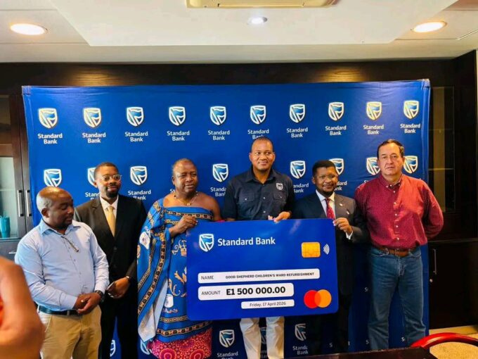 Standard Bank Eswatini Chief Executive Mvuselelo Fakudze (centre) hands over a cheque to representatives of Good Shepherd Hospital,