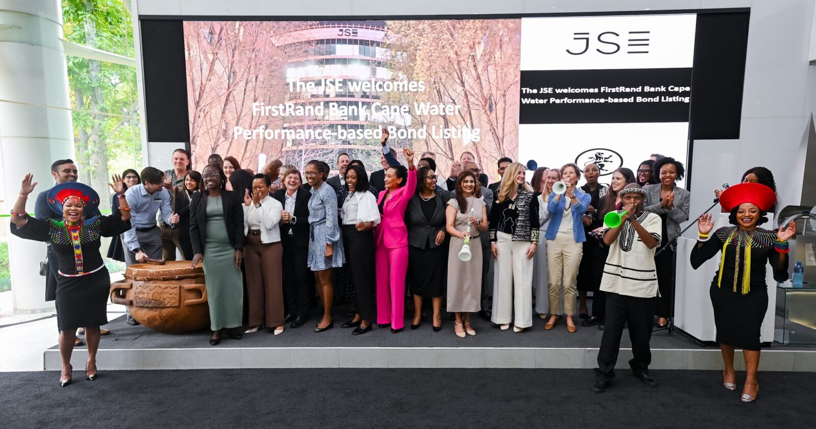 Representatives from FirstRand Bank, RMB, the International Finance Corporation, FSD Africa Investments and Aluwani Capital Partners gather at the Johannesburg Stock Exchange during the listing of Africa's first Nature-Linked Performance-Based Bond on April 17, 2026.