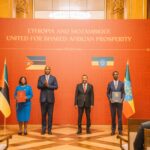Mozambican President Daniel Francisco Chapo and Ethiopian Prime Minister Abiy Ahmed pictured with their respective representatives following the signing of a Memorandum of Understanding on digital identity and Public Digital Infrastructure in Addis Ababa on Monday.