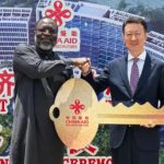 ECOWAS Commission President Omar Alieu Touray accepts the keys to the newly completed $56.5 million ECOWAS Headquarters Complex in Abuja