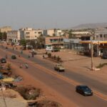 People move on a street after insurgents launched attacks on military bases across the country, in Bamako, Mali April 25, 2026. REUTERS/Aboubacar Traore