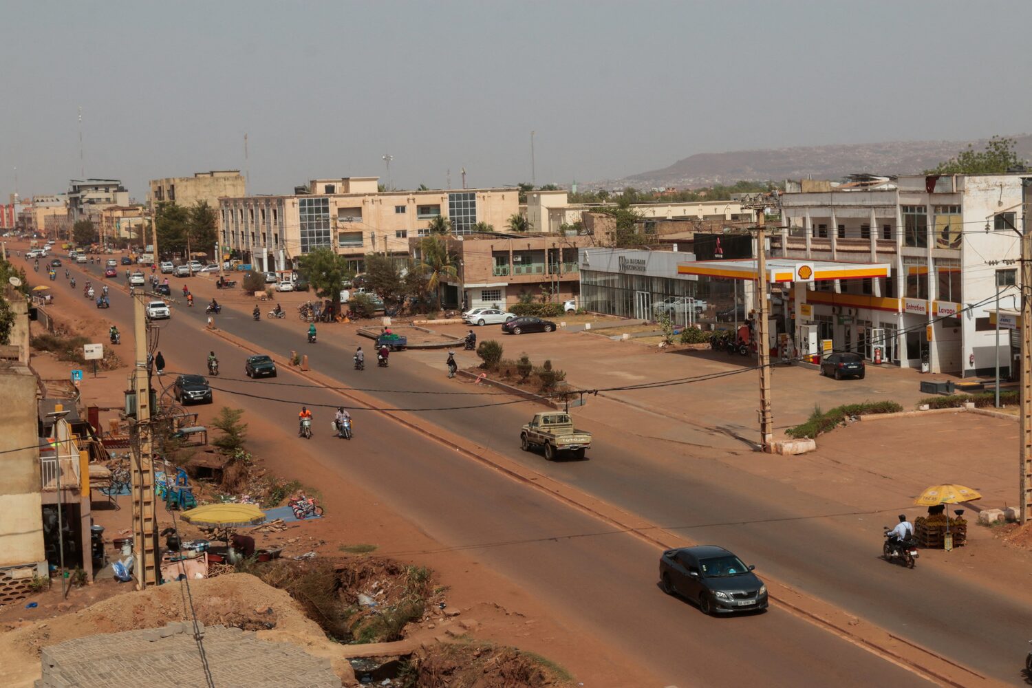 People move on a street after insurgents launched attacks on military bases across the country, in Bamako, Mali April 25, 2026. REUTERS/Aboubacar Traore