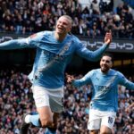 Erling Haaland’s penalty celebration was quickly followed by his second goal before half-time. Photograph: Jason Cairnduff/Action Images/Reuters